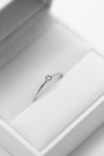 Petit solitaire serti clos // 0,05ct